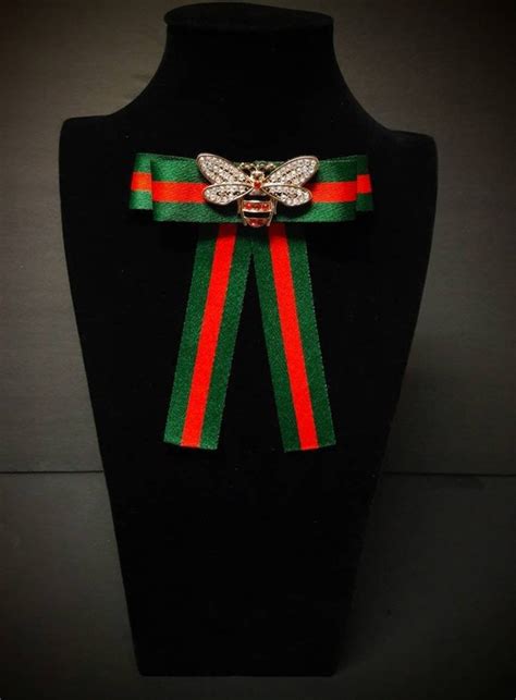 gucci bows for shoes|gucci bow tie brooch.